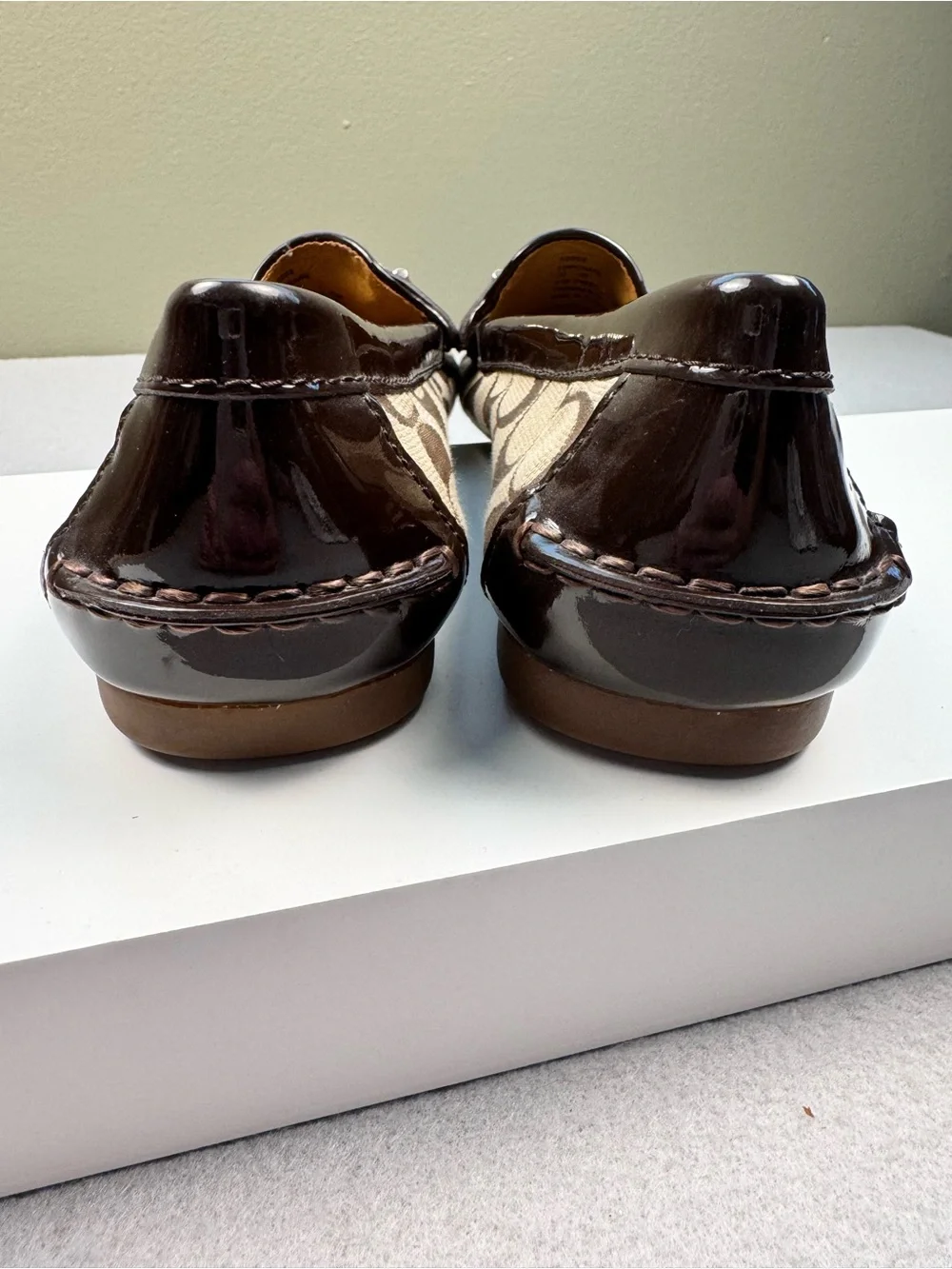 Coach Fortunata loafers with Dark Brown Trim and Gold-Tone Chain
